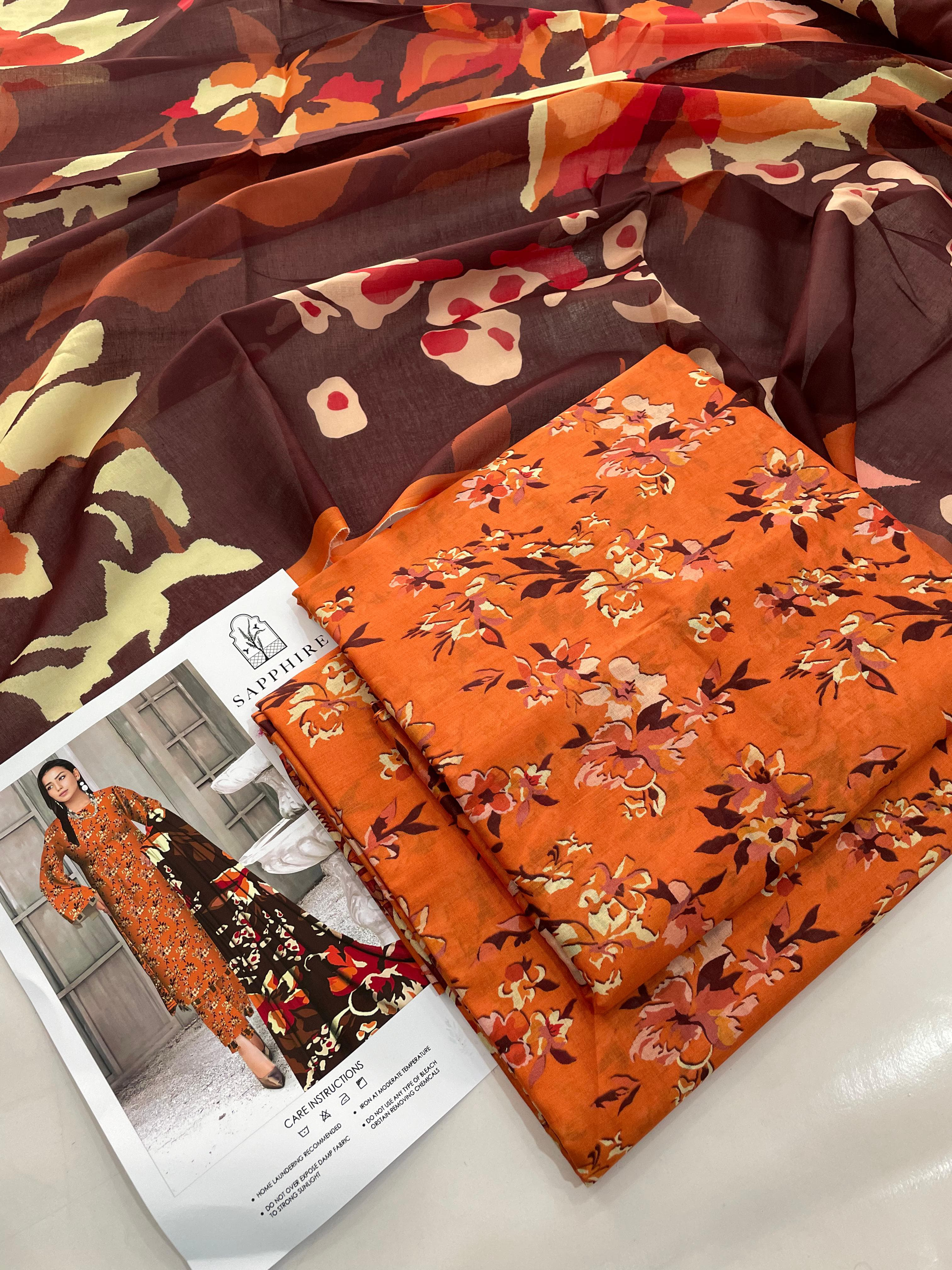 Sapphire Earthy Orange & Brown Floral Digital Print Lawn Suit | Unstitched 3-Piece Pakistani Summer Collection for Women Best SEO Long Description:
