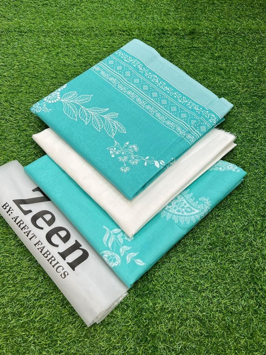 Zeen by Arfat Fabrics: Refreshing Turquoise Printed Lawn Suit with Elegant White Botanical Motifs – Unstitched Summer Fashion